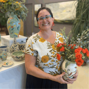 Maria Andrade Troya square headshot with finished pots