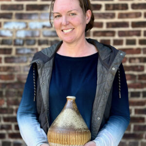 Kat Reeves - Ceramic artist and educator with wood and soda ash fired vessel