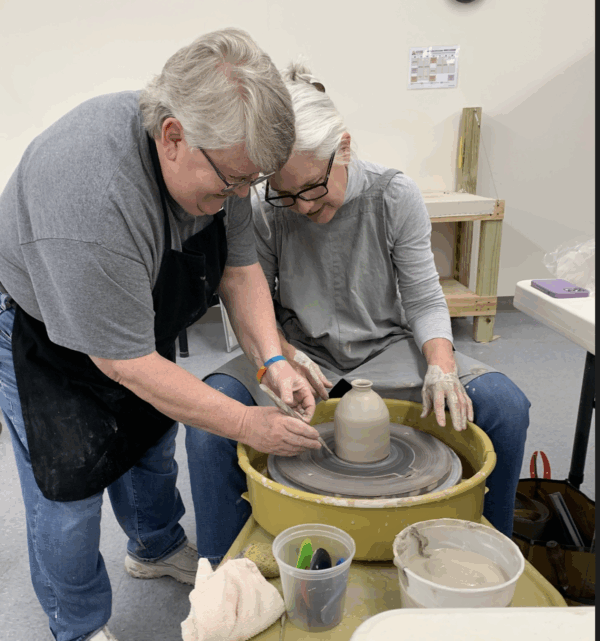 Julia Mann helping student